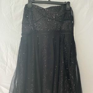 Black short sequin prom/homecoming dress. New with tags. Never been worn.